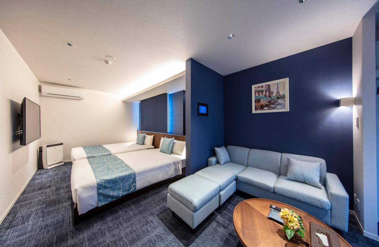 Апарт отель Grand Base Okayama Ekimae Экстерьер фото