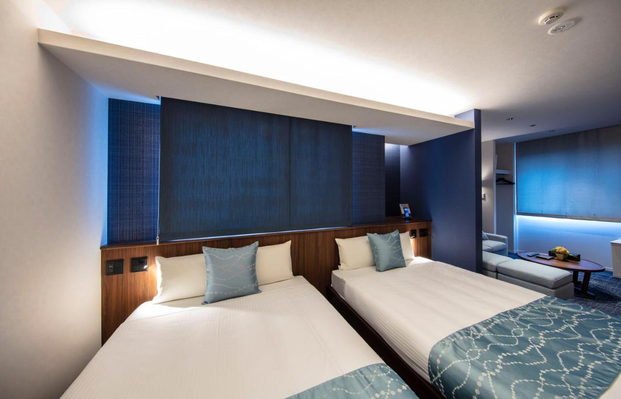 Апарт отель Grand Base Okayama Ekimae Экстерьер фото