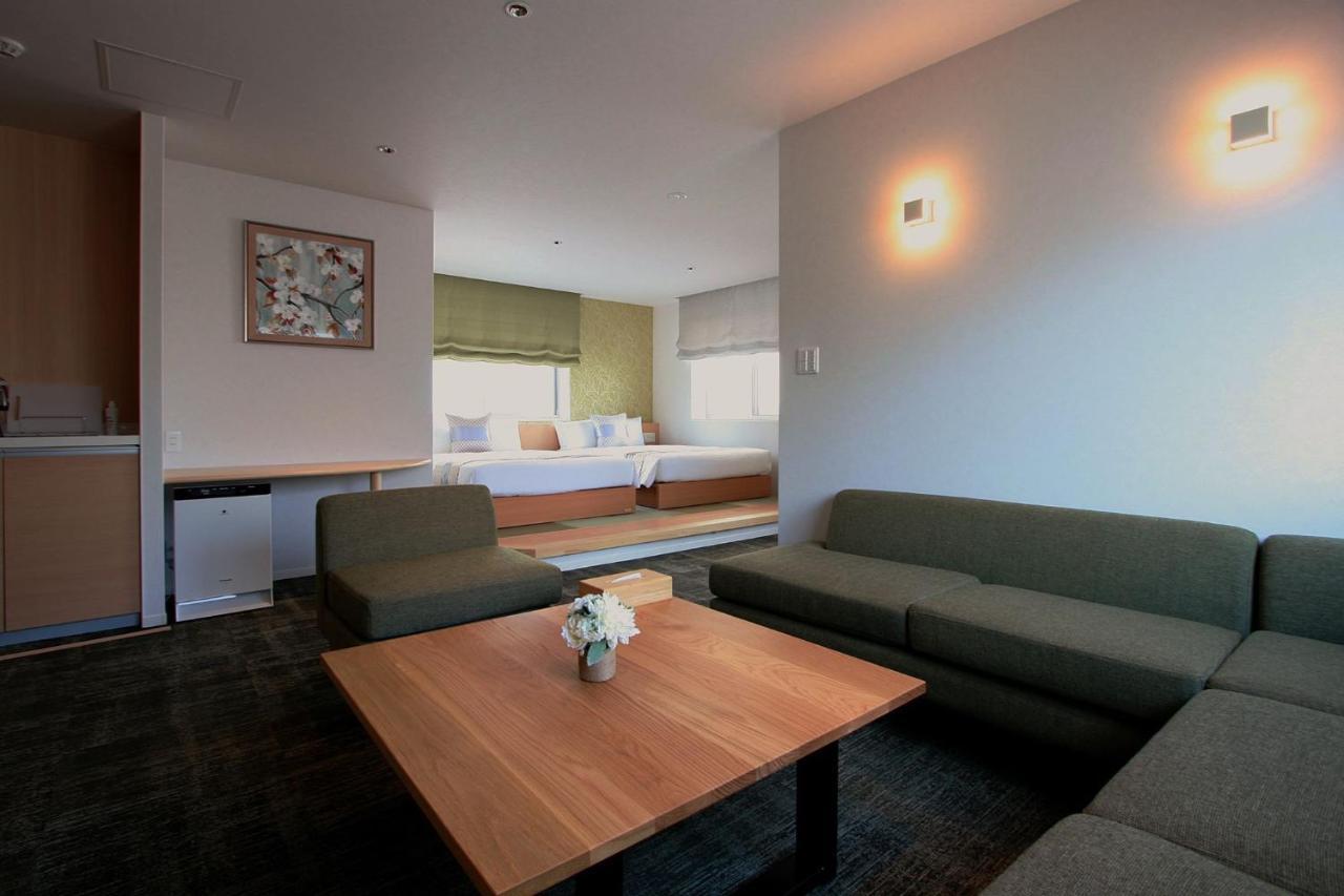Апарт отель Grand Base Okayama Ekimae Экстерьер фото