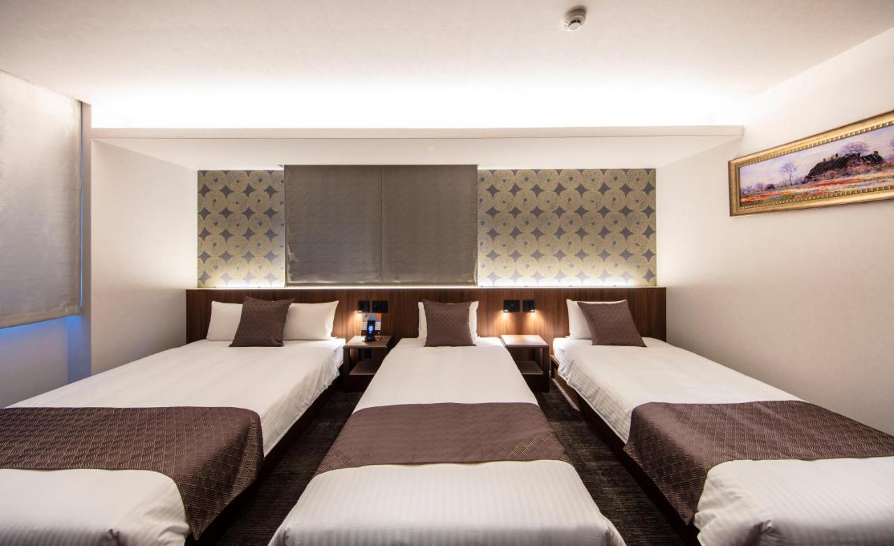 Апарт отель Grand Base Okayama Ekimae Экстерьер фото